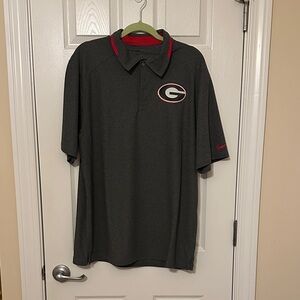 Nike Men's Dark Gray Polo Shirt with Red Accents